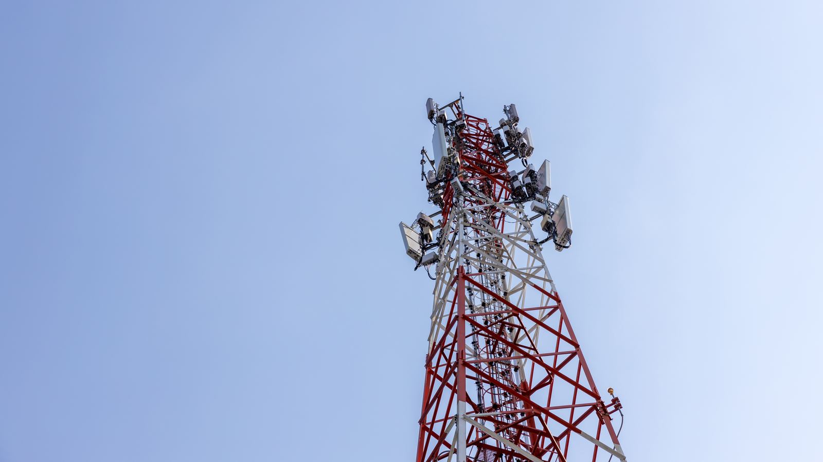 Cell tower against a clear sky